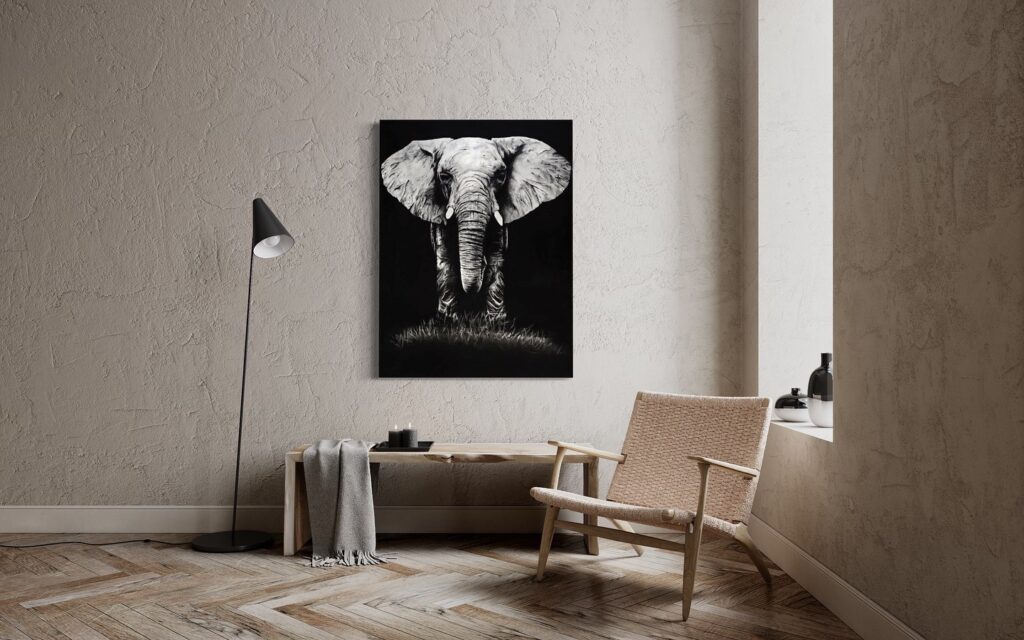 An elephant drawn using graphite, framed in a modern apartment.